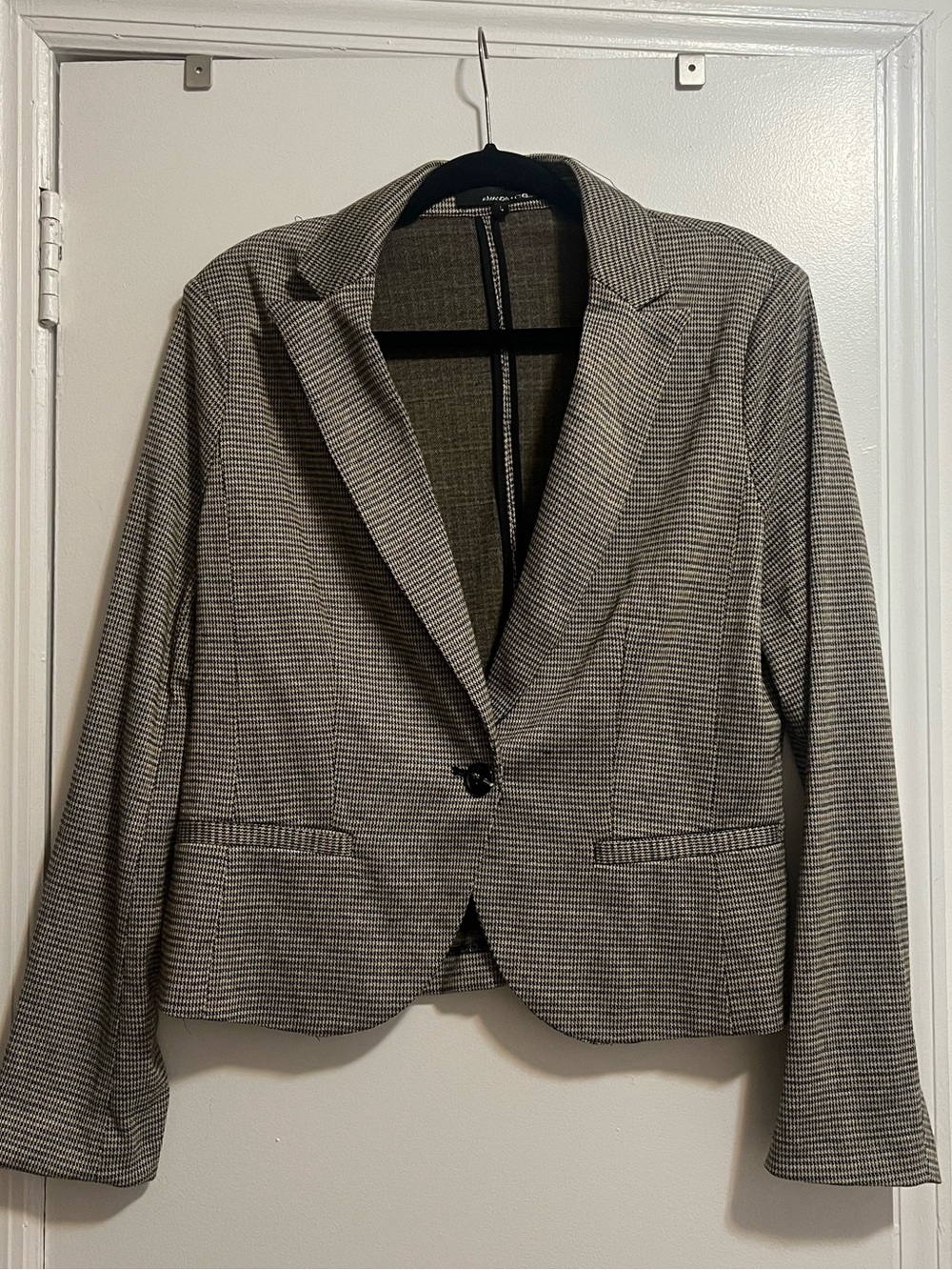Brown and black plaid blazer with soft shoulder pads